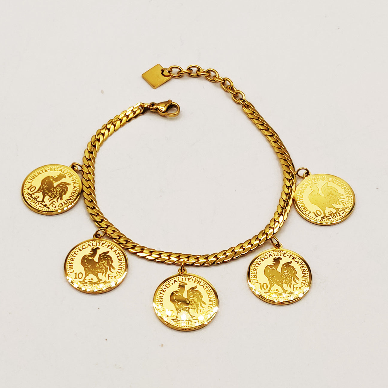 Bracelet avec médailles pièces françaises