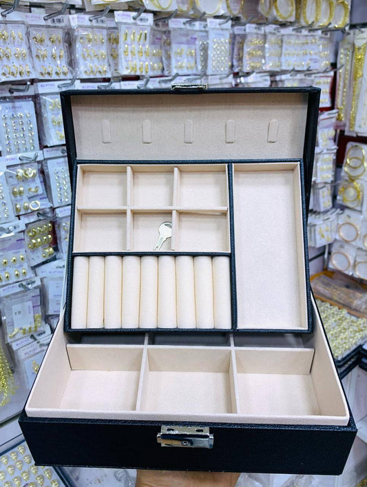Coffret à bijoux rose avec compartiments multiples