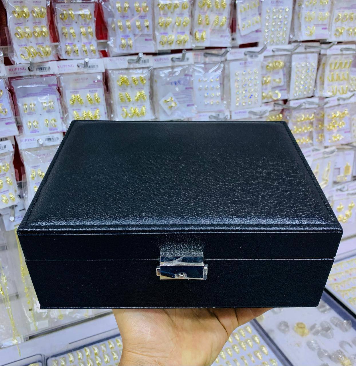 Coffret à bijoux rose avec compartiments multiples